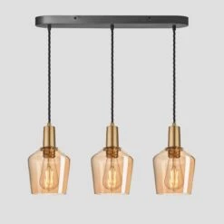 Sleek Tinted Glass Schoolhouse 3 Wire Oval Cluster Lights - 5.5 Inch - Amber -Lumi Home Shop 5.5 Inch Pendant Glass Industville Lighting Schoolhouse BrassHolder Sleek SL TGL SH5 3WOCL A BH
