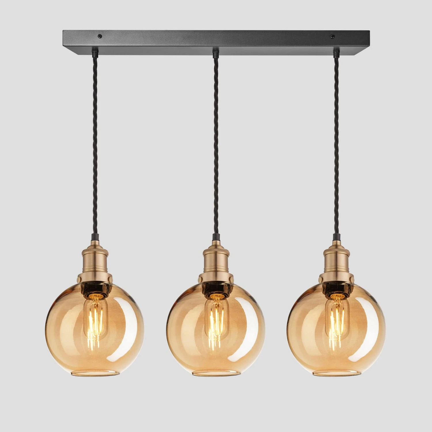 Brooklyn Tinted Glass Globe 3 Wire Cluster Lights - 7 Inch - Amber 6 Brooklyn Tinted Glass Globe 3 Wire Cluster Lights - 7 Inch - Amber - Image 4