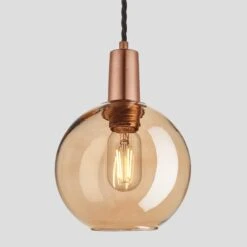 Sleek Tinted Glass Globe Pendant - 7 Inch - Amber -Lumi Home Shop 7 Inch Pendant Tinted Glass Amber Globe Copper Sleek SL TGL GLP7 A CH Lit