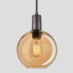 Sleek Tinted Glass Globe Pendant - 7 Inch - Amber -Lumi Home Shop 7 Inch Pendant Tinted Glass Amber Globe Pewter Sleek SL TGL GLP7 A PH Lit