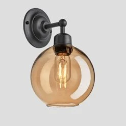 Orlando Tinted Glass Globe Wall Light - 7 Inch - Amber -Lumi Home Shop 7 Inch Wall Light Tinted Glass Amber Globe Pewter Orlando OR TGL GLWL7 A PH Angled Lit