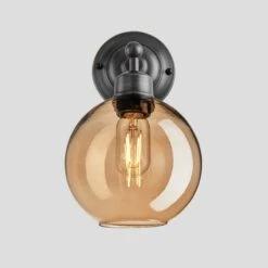 Orlando Tinted Glass Globe Wall Light - 7 Inch - Amber -Lumi Home Shop 7 Inch Wall Light Tinted Glass Amber Globe Pewter Orlando OR TGL GLWL7 A PH SO Lit