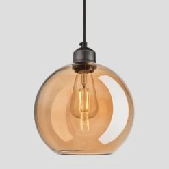 Front Page -Lumi Home Shop 9 Inch Pendant Tinted Glass Amber Globe Pewter Orlando OR TGL GLWL9 A PH Lit