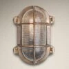 6 Inch Solid Brass Bulkhead Outdoor & Bathroom Oval Wall Light With Versatile Side & Rear Wiring Options 1 6 Inch Solid Brass Bulkhead Outdoor & Bathroom Oval Wall Light With Versatile Side & Rear Wiring Options -Lumi Home Shop Bulkhead Wall Light Brass Oval Back Side Wiring BK IP65 OWL6 B BSW RB Front Industville TexturedBG