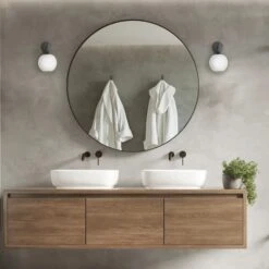 Chelsea Opal Glass Globe Wall Light - 7 Inch - White 24 Chelsea Opal Glass Globe Wall Light - 7 Inch - White -Lumi Home Shop CH OGL GLWL7 W PHINDUSTVILLEB2CBATHROOMLIGHTMINIMAL AdobeStock