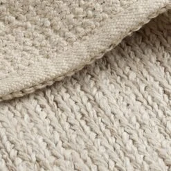 Nash Hand Woven Jute Rug - Cream 10 Nash Hand Woven Jute Rug - Cream -Lumi Home Shop Natural Nash Handwoven Jute Cream Rug Industville RG 8 HWJ CR Fold Closeup